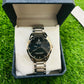 Rolex watch in a blue box on grass